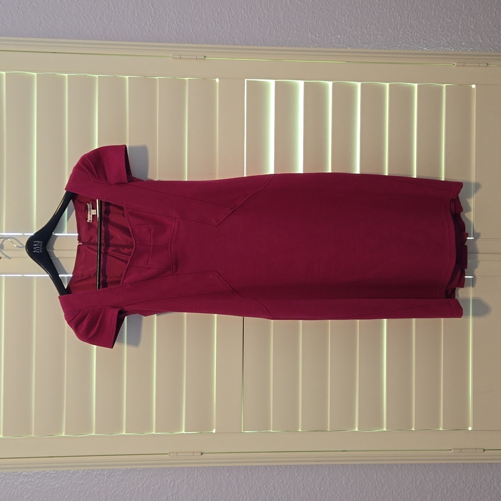 Nanette Lepore Facny knit dress with unique neck scoop and puff shoulder caps